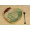 Bride & Groom's Table ceramic heart shaped dinner plate set with Hosta plant texture. Glazed in teal with maroon on adjacent edges. 8"x9"