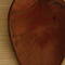 Ceramic leaf tray glazed in rusty metallic with catalpa leaf texture. 7"x9"