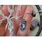 hematite chips, 20g wire, small metal owl charm, crystal clear glass beads, embroidery floss wrapped hoop