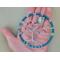 i'm holding the turquoise tree in my hand. It is 3inches and fits nicely in my palm. Light blue color cotton yarn wrapped hoop