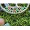 close up of glass seed beads entwined into wire roots