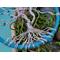 details show wire roots connected to metal hoop as the grounding of the tree curvy twisted roots made from aluminum wire