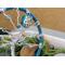 close up glass beaded wire twiseted branches, showcasing cute chunky ceramic owl 