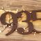 Close up of copper vein powder coat on our metal house number sign.