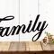 Close up of family script metal sign, in matte black powder coat.