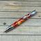 red and gold dragon pen