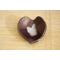 Ceramic heart shaped spoon rest. Glazed in dark purple and cream color. Approximately 3"x3.5"
