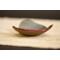 Ceramic heart shaped spoon rest. Glazed in red and blue. Approximately 3"x3.5"