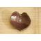 Ceramic heart shaped spoon rest. Glazed in cool red and mint green speckles. Approximately 3"x3.5"