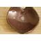 Ceramic heart shaped spoon rest. Glazed in cool red and mint green speckles. Approximately 3"x3.5"
