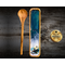 Unique blend of functionality and artistry with our olive wood spoon rest with spoon. Resin art, 24K gold ribbons, and a lighthouse design.