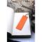 Back of bookmark in solid orange with jute rope tassel.