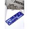 Front of bookmark, royal blue background, handwritten letting in white, starfish, turtles, jute rope tassel.