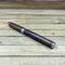 bright chrome and wood rollerball pen