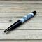 Scrimshaw art on a ballpoint pen