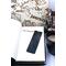 Back of bookmark in solid black with jute rope tassel.