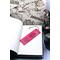 Front of bookmark, hot pink background, black handwritten lettering, black and white dot art designs around edge.  Jute rope tassel.