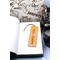Front of bookmark, orange background, handwritten black lettering, white and black dot art flowers, jute rope tassel.