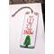 Front of bookmark, white background, red lettering, Christmas Tree and jute rope tassel.