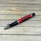 red, black, and chrome jeep pen