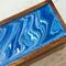 Blue and white with glossy finish to top  of tea organizer.