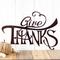 Close up of Give Thanks lettering on our metal sign, in copper vein powder coat.