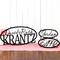 Hanging oval family name, child name, and established metal signs, in matte black powder coat.