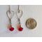 Shaped Valentine heart earrings with red swarovski crystals. The earrings are 2 inches in length.