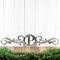 Metal monogram sign with vines, in raw steel.