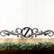 Metal monogram sign with vines, in matte black powder coat.