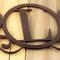 Close up of copper vein powder coat on our metal monogram sign.