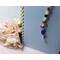 Multi color glass and clear faceted crystal beaded bookmark with a silver tone dragonfly charm at the end. Measures 12" in length.
