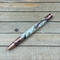 Antique Copper pen with fly fishing USPS stamps