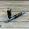 Gray and black wood burl pen