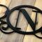 Close up of matte black powder coat on our metal monogram sign.