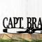 Close up of lettering on our Aviator metal name sign with established year, in matte black powder coat.