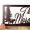 Close up of moose silhouette on our family last name metal sign, in copper vein powder coat.