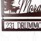 Close up of metal address sign on our family name sign, with a moose silhouette, in copper vein powder coat.