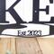 Close up of established year on our propeller metal sign, in silver vein powder coat.