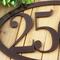 Close up of copper vein powder coat on our oval metal house number sign.