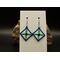 Machine embroidered diamond shaped earrings. Yellow background with dk blue & turquoise. Rainbow hooks, aqua crystal rivet in the center.
