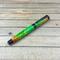 shiny multicolor rollerball pen in black chrome hardware