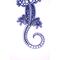 Close up of Front side of 3D printed blue salamander with hand painted white dot art