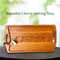 Beautiful handcrafted cherry serving tray with custom engraving, featuring smooth handles and a rich wood finish, perfect for home decor.