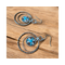 A trendy long pair of western earrings are handmade and flashy. hoop earrings with concho.