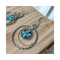  The charm dangling from the fishhook wire gives off a bit of western flare.
