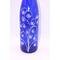 View of alternate side of bottle with hand painted dot art
