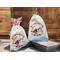 Ornaments come in a burlap bag, ready for gift giving. Bags will vary in color and style with the season.