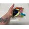 Black-backed kingfisher suncatcher being held for size reference.