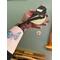 Chickadee Suncatcher being held for size reference.